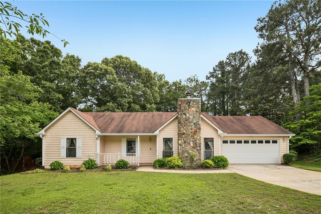 1318 Panhandle Way Hampton, GA 30228 - Photo 1 of 22 a front view of house with yard and green space