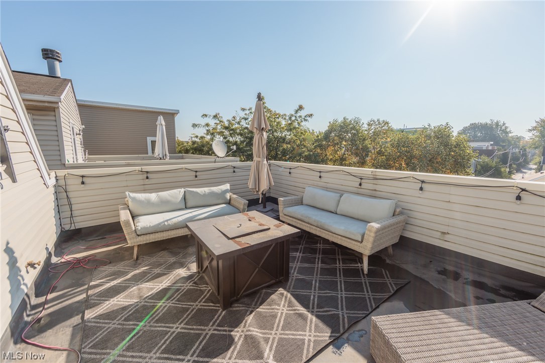603 Literary Road Cleveland, OH 44113 - Photo 26 of 35 View of terrace with an outdoor living space