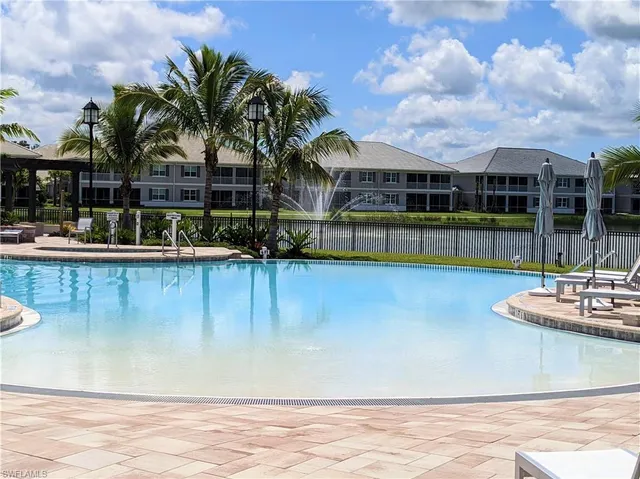 a view of a house with swimming pool