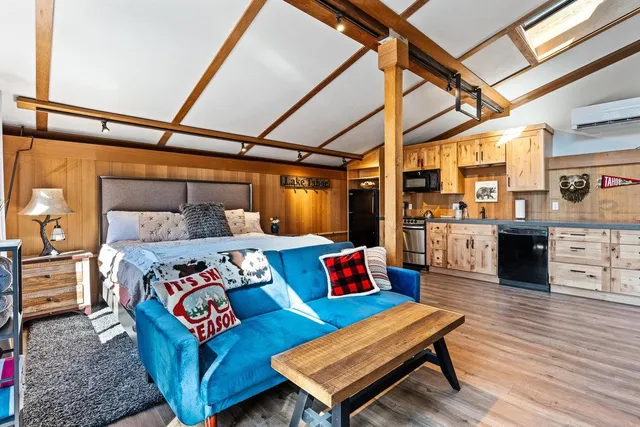 a outdoor living space with furniture and a rug