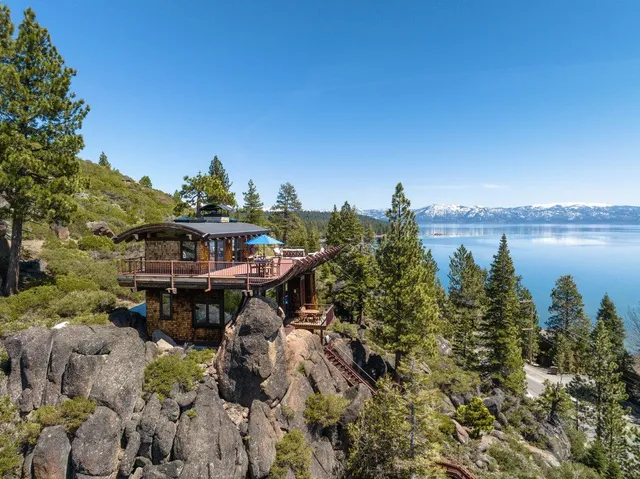 a view of a lake with sitting area