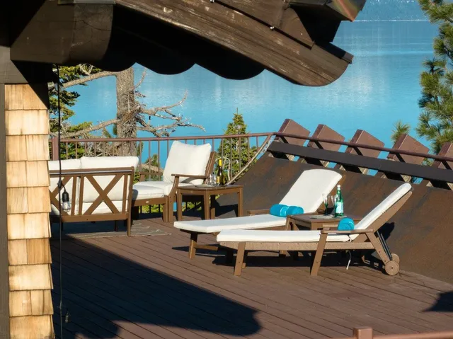 an outdoor sitting area with furniture