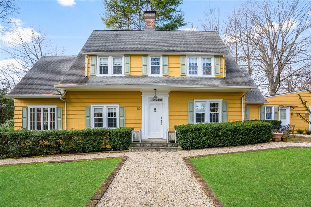 60 Seaview Avenue New Rochelle, NY 10801 - Photo 1 of 1 a front view of a house with a yard