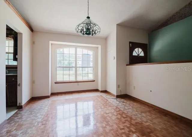 an empty room with windows