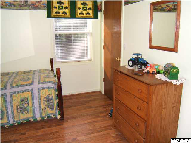 274 Good Hope Church Road Aroda, VA 22709 - Photo 17 of 23 a room with wooden floor and window