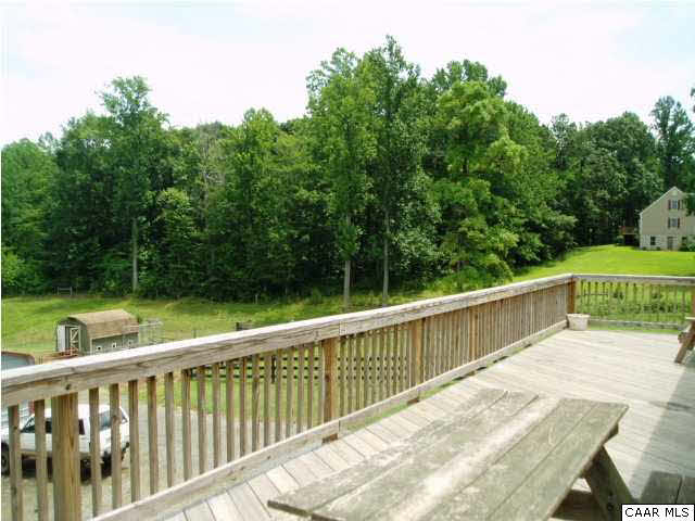274 Good Hope Church Road Aroda, VA 22709 - Photo 9 of 23 a view of a wooden deck next to a yard