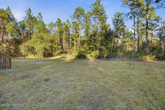 a view of outdoor space and yard