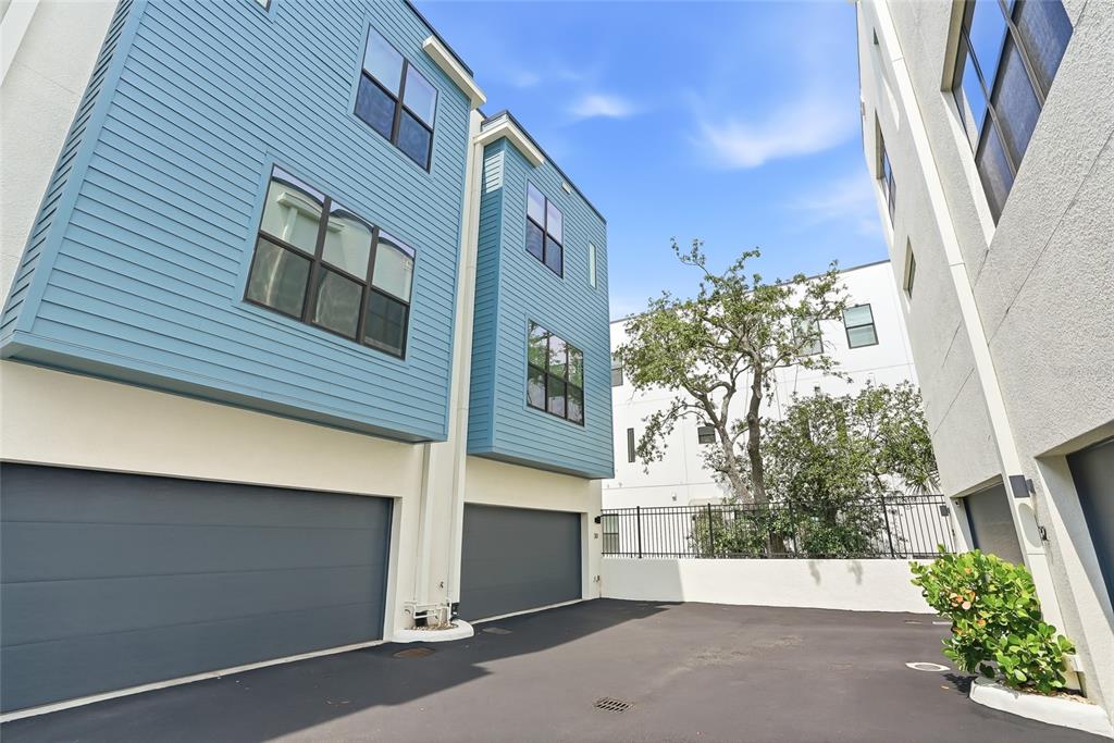 4810 West McElroy Avenue, Unit 30 Tampa, FL 33611 - Photo 34 of 43 a view of a house with a street
