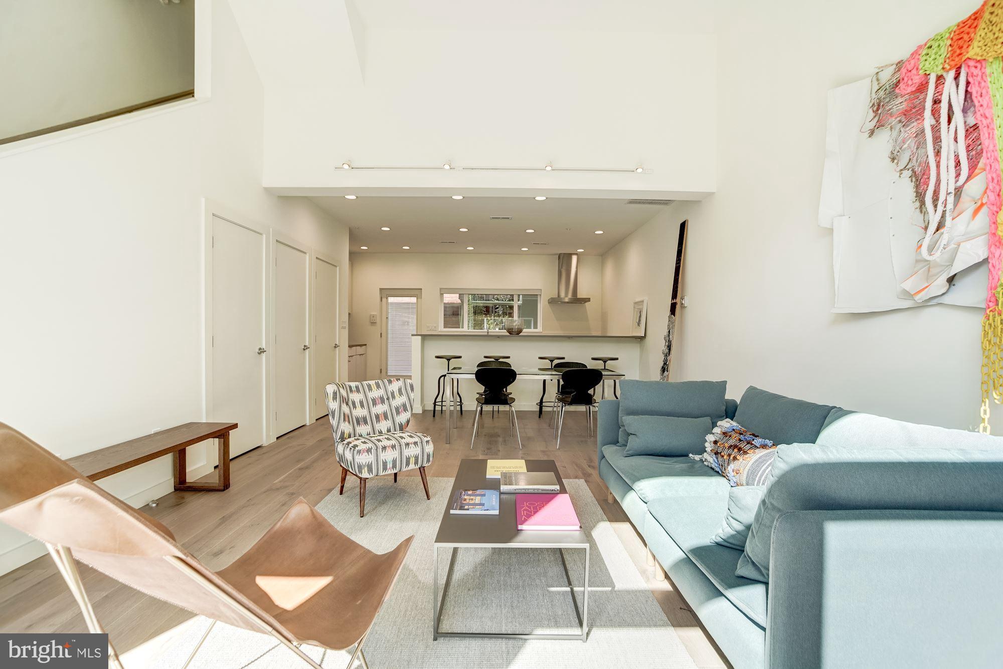 446 Ridge Street Northwest Washington, DC 20001 - Photo 11 of 24 a living room with furniture rug and couch