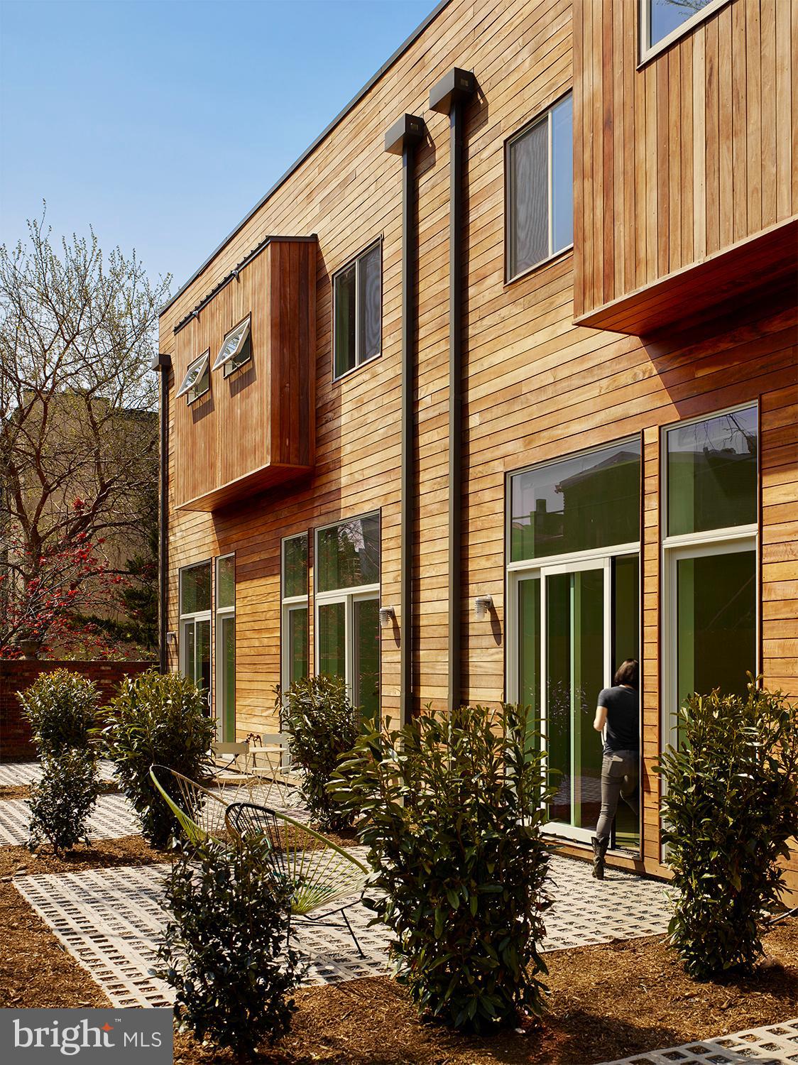 446 Ridge Street Northwest Washington, DC 20001 - Photo 24 of 24 a front view of a house with a yard