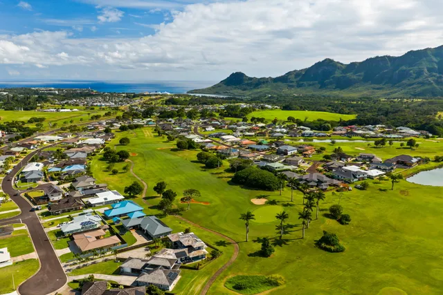 a view of residential houses with outdoor space