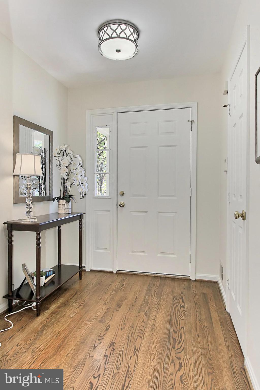 7469 Ridge Oak Court Springfield, VA 22153 - Photo 4 of 18 Here is the foyer and powder room on the right.