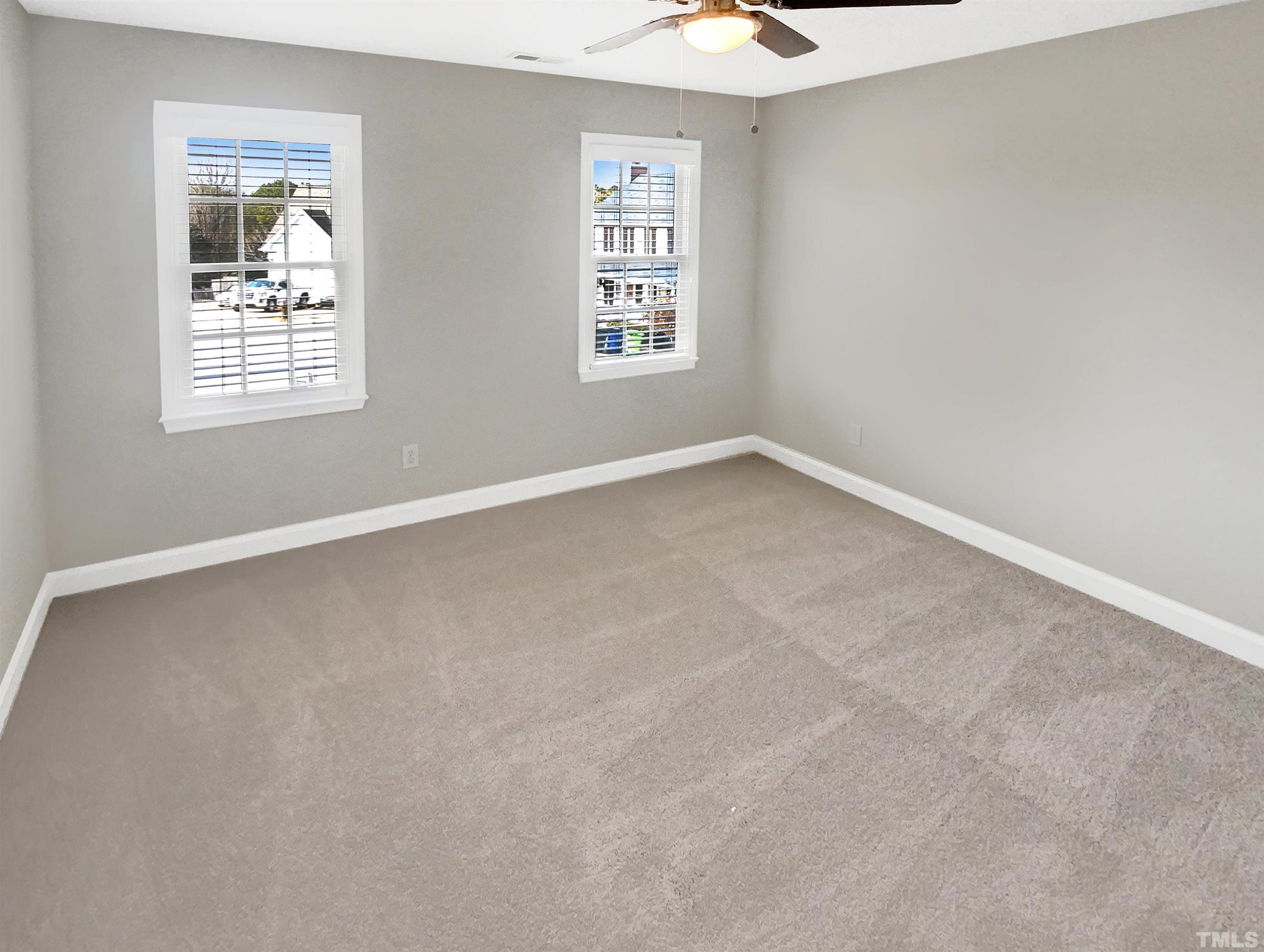 3216 Leebrook Road Raleigh, NC 27616 - Photo 15 of 17 an empty room with windows