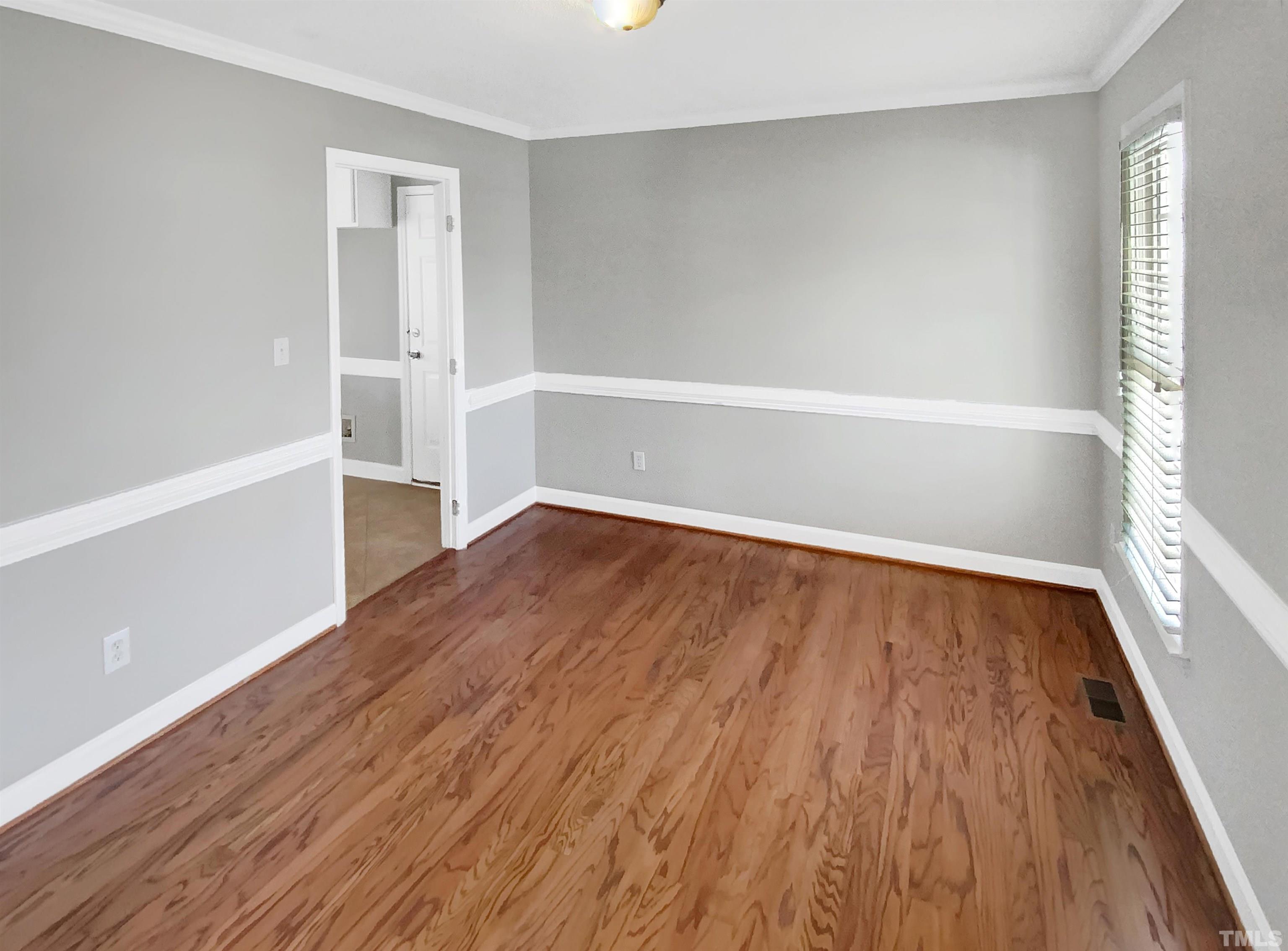 3216 Leebrook Road Raleigh, NC 27616 - Photo 3 of 17 a view of wooden floor in an empty room
