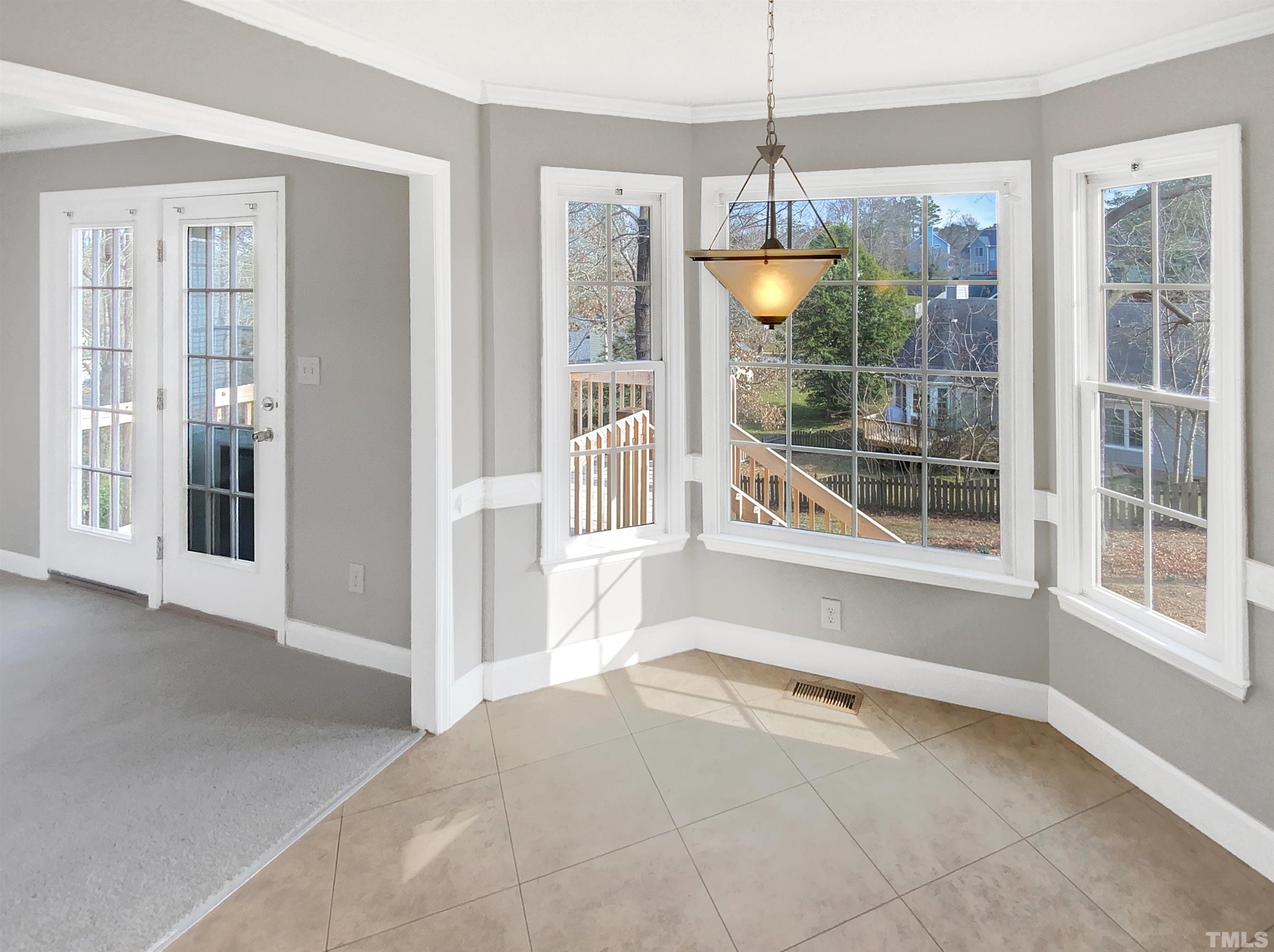3216 Leebrook Road Raleigh, NC 27616 - Photo 6 of 17 a view of an empty room with a window