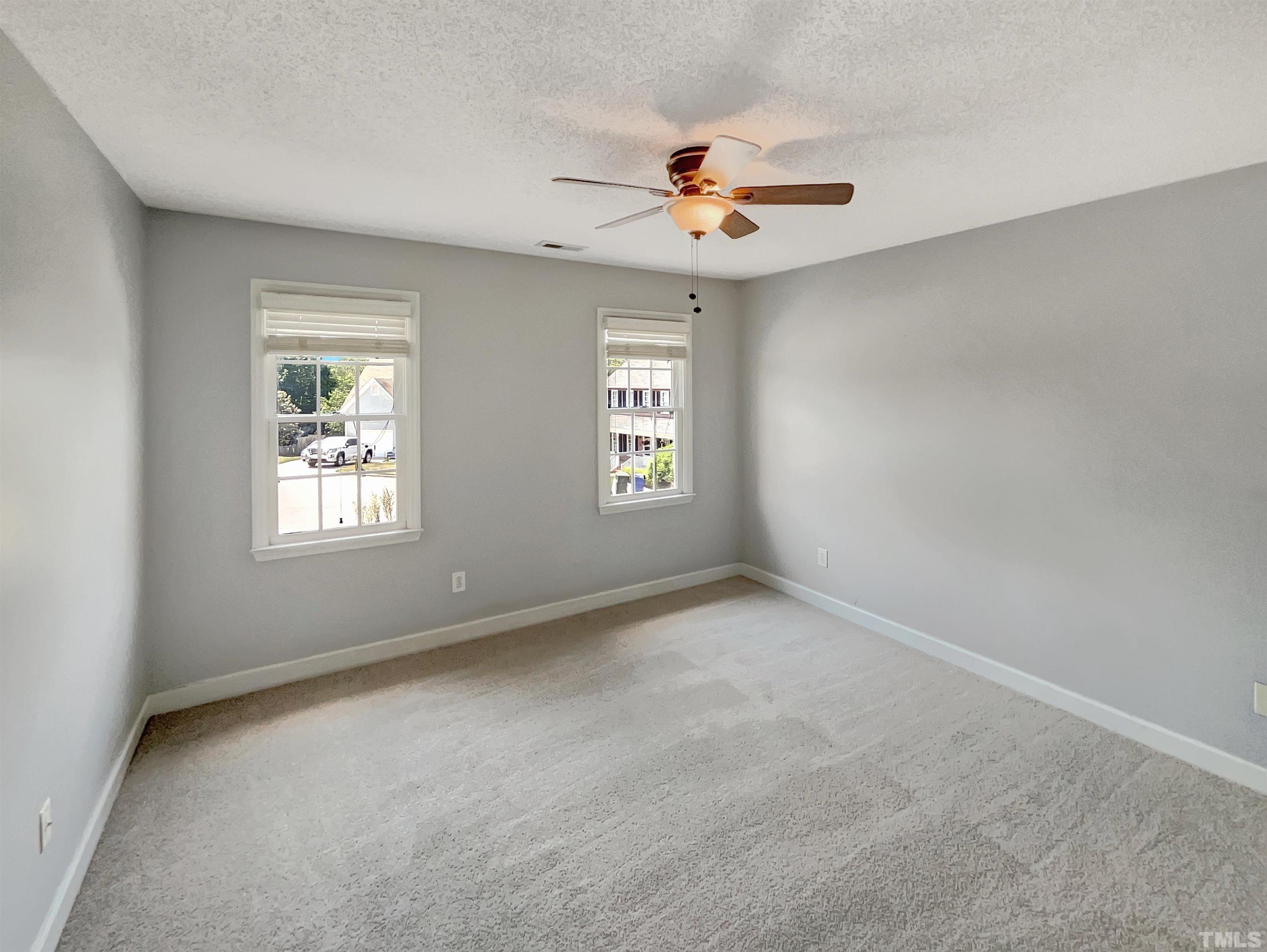 3216 Leebrook Road Raleigh, NC 27616 - Photo 9 of 17 a view of an empty room with a window