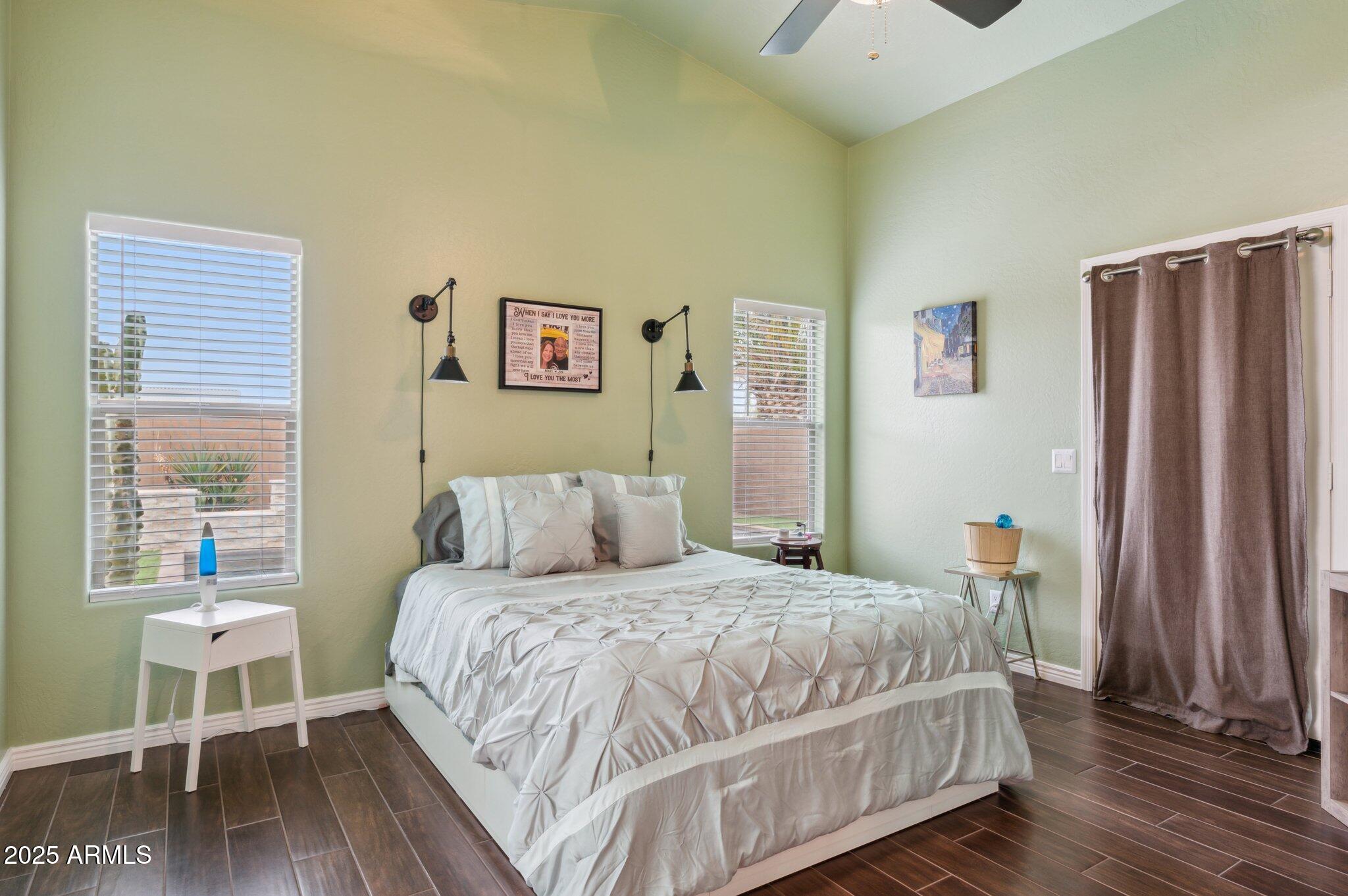 411 West Gascon Road San Tan Valley, AZ 85143 - Photo 12 of 30 a bedroom with a bed and a window