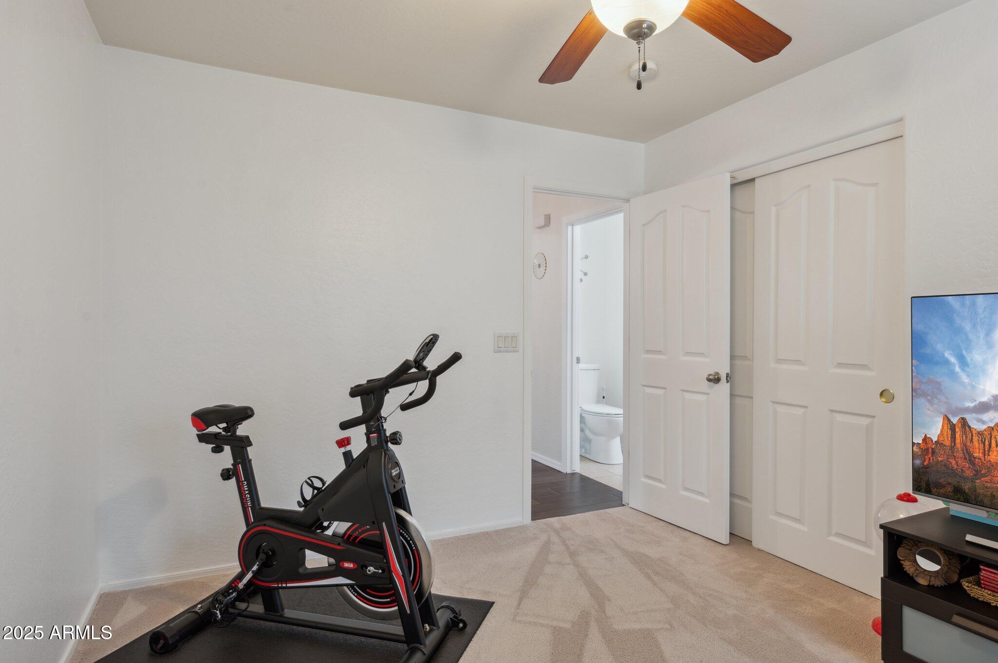 411 West Gascon Road San Tan Valley, AZ 85143 - Photo 21 of 30 a view of a room with gym equipment