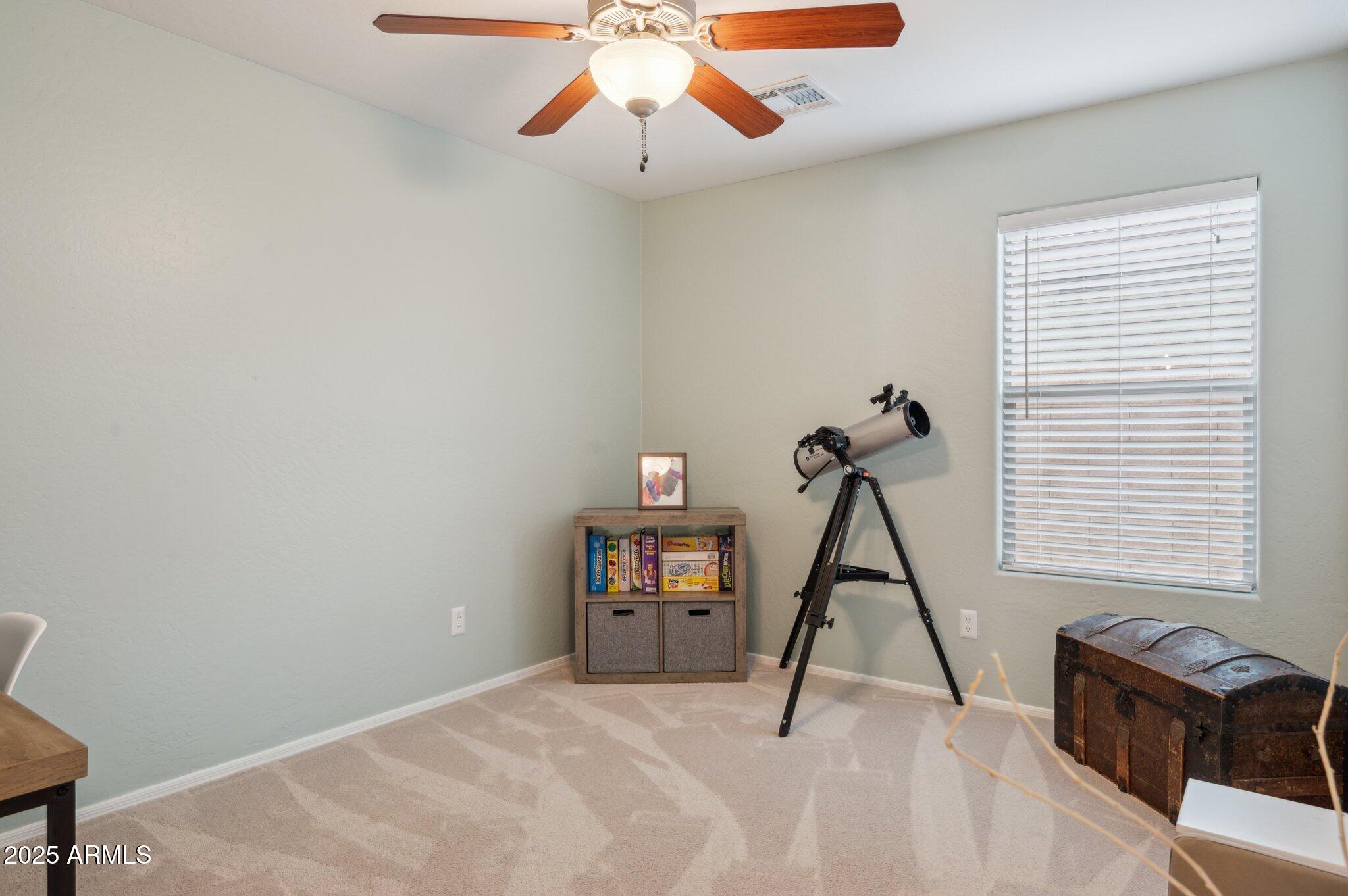 411 West Gascon Road San Tan Valley, AZ 85143 - Photo 25 of 30 a view of a room with gym equipment