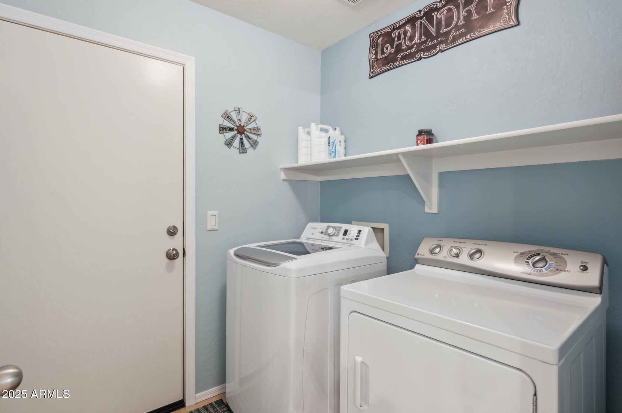 411 West Gascon Road San Tan Valley, AZ 85143 - Photo 26 of 30 a utility room with dryer and washer