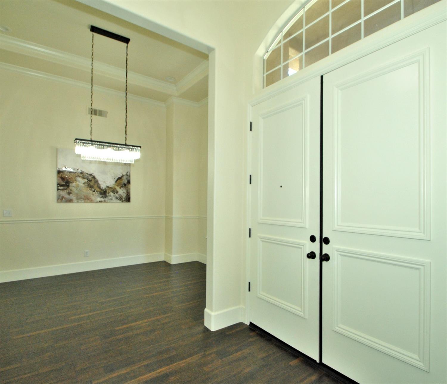 10584 Keats Avenue Clovis, CA 93619 - Photo 13 of 72 a view of a room with wooden floor and white walls