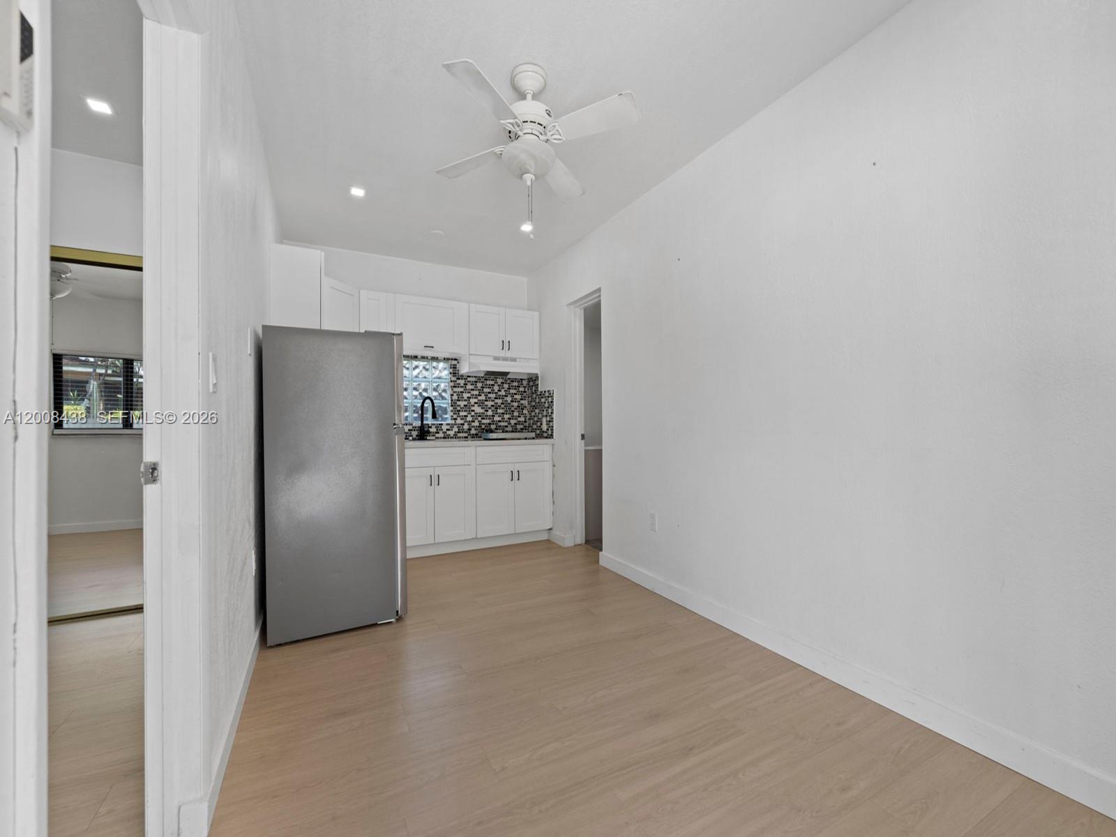 252 East 36th Street, Unit A Hialeah, FL 33013 - Photo 7 of 10 a view of a kitchen with refrigerator and cabinet