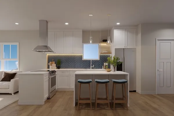 a kitchen with a table and chairs