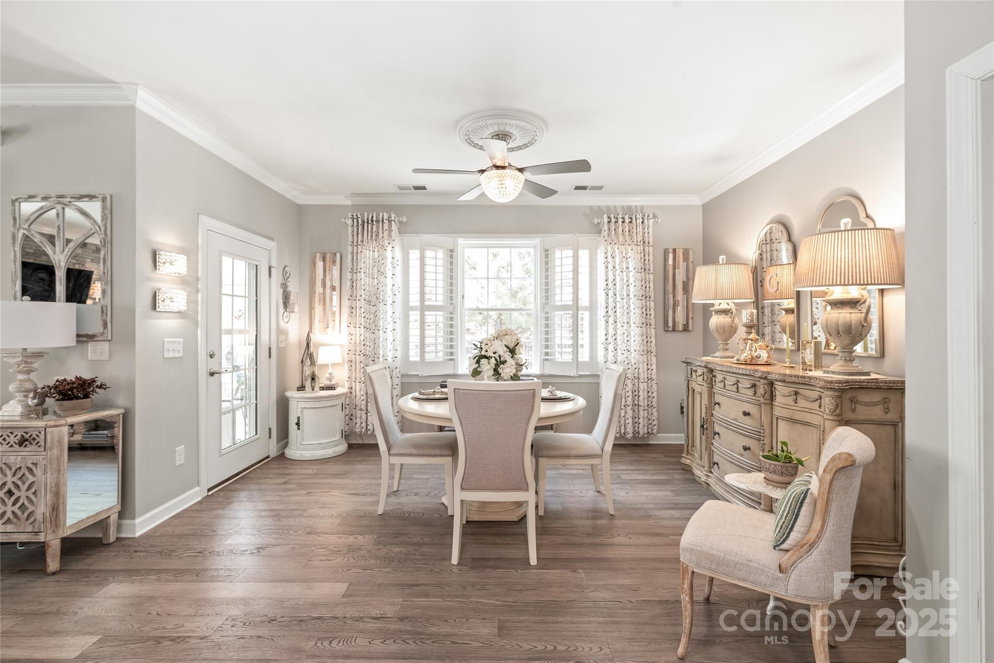 5002 Samoa Ridge Drive Lancaster, SC 29720 - Photo 16 of 45 a dining room with furniture a chandelier and wooden floor