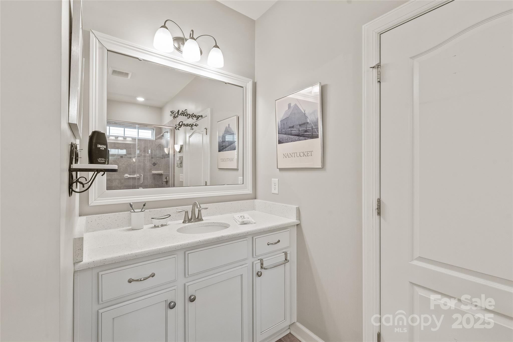 5002 Samoa Ridge Drive Lancaster, SC 29720 - Photo 21 of 45 a bathroom with a sink and a mirror