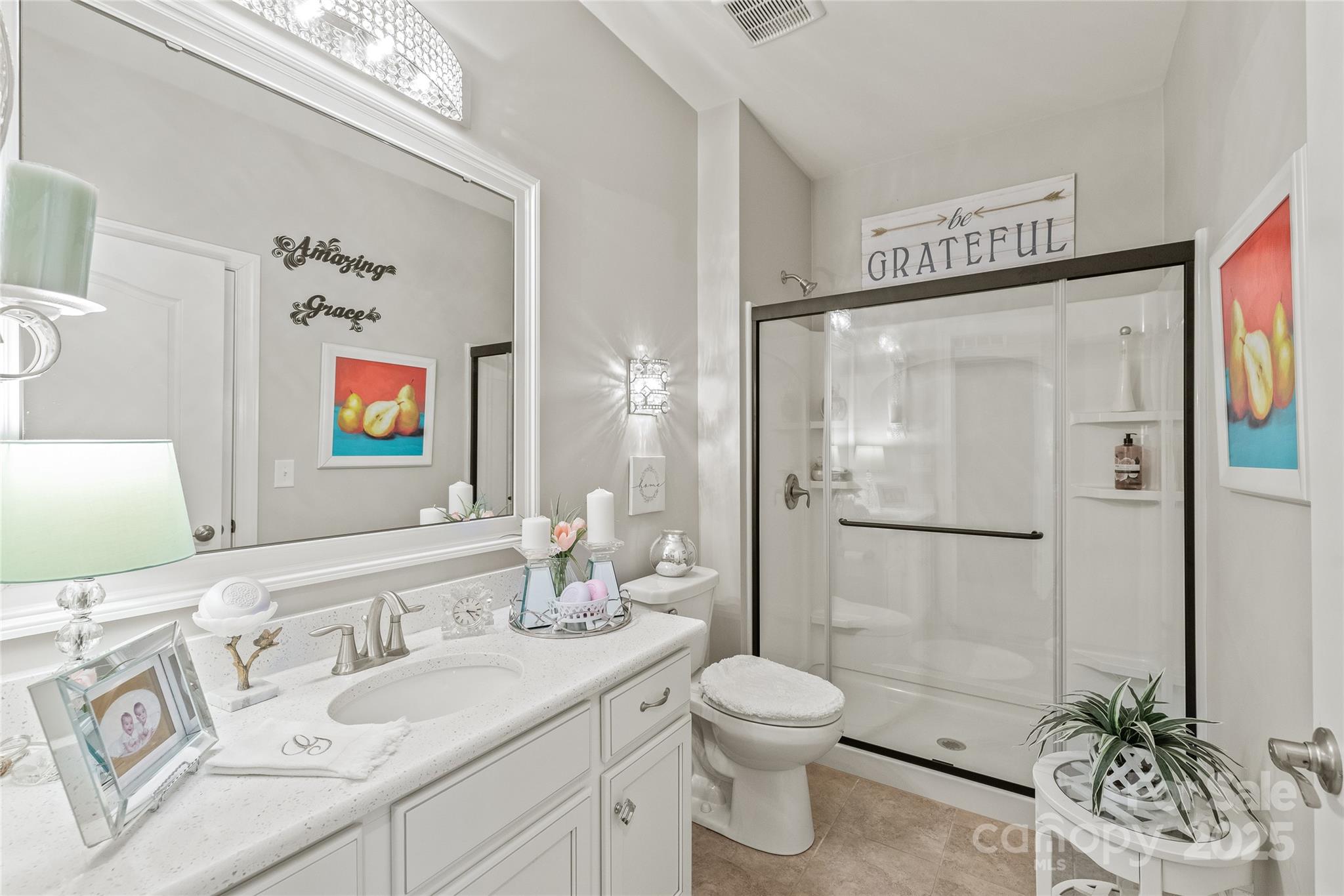 5002 Samoa Ridge Drive Lancaster, SC 29720 - Photo 24 of 45 a bathroom with a granite countertop sink toilet and shower