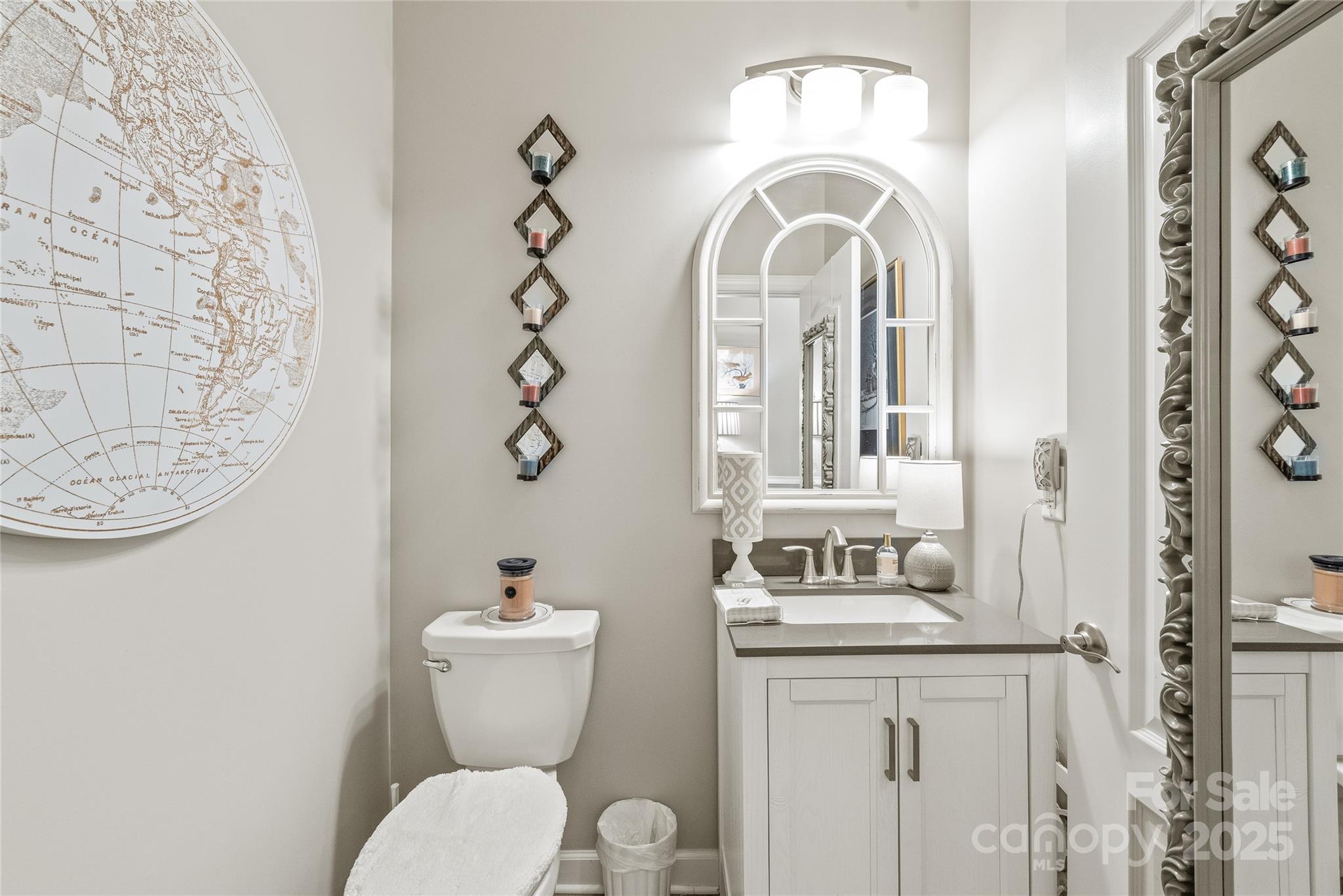 5002 Samoa Ridge Drive Lancaster, SC 29720 - Photo 27 of 45 a bathroom with a toilet sink and mirror