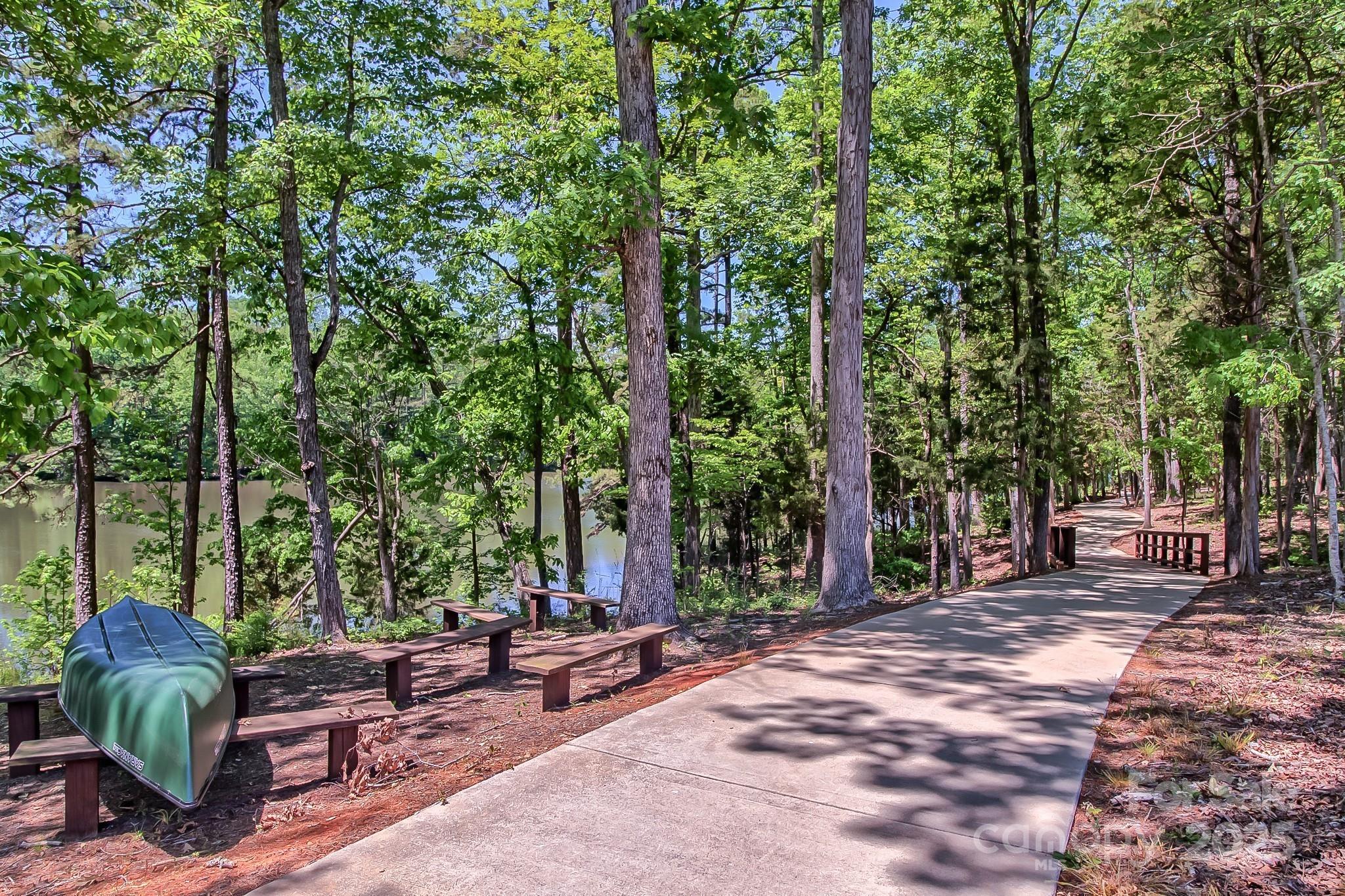 5002 Samoa Ridge Drive Lancaster, SC 29720 - Photo 40 of 45 a backyard of a house with barbeque oven table and chairs