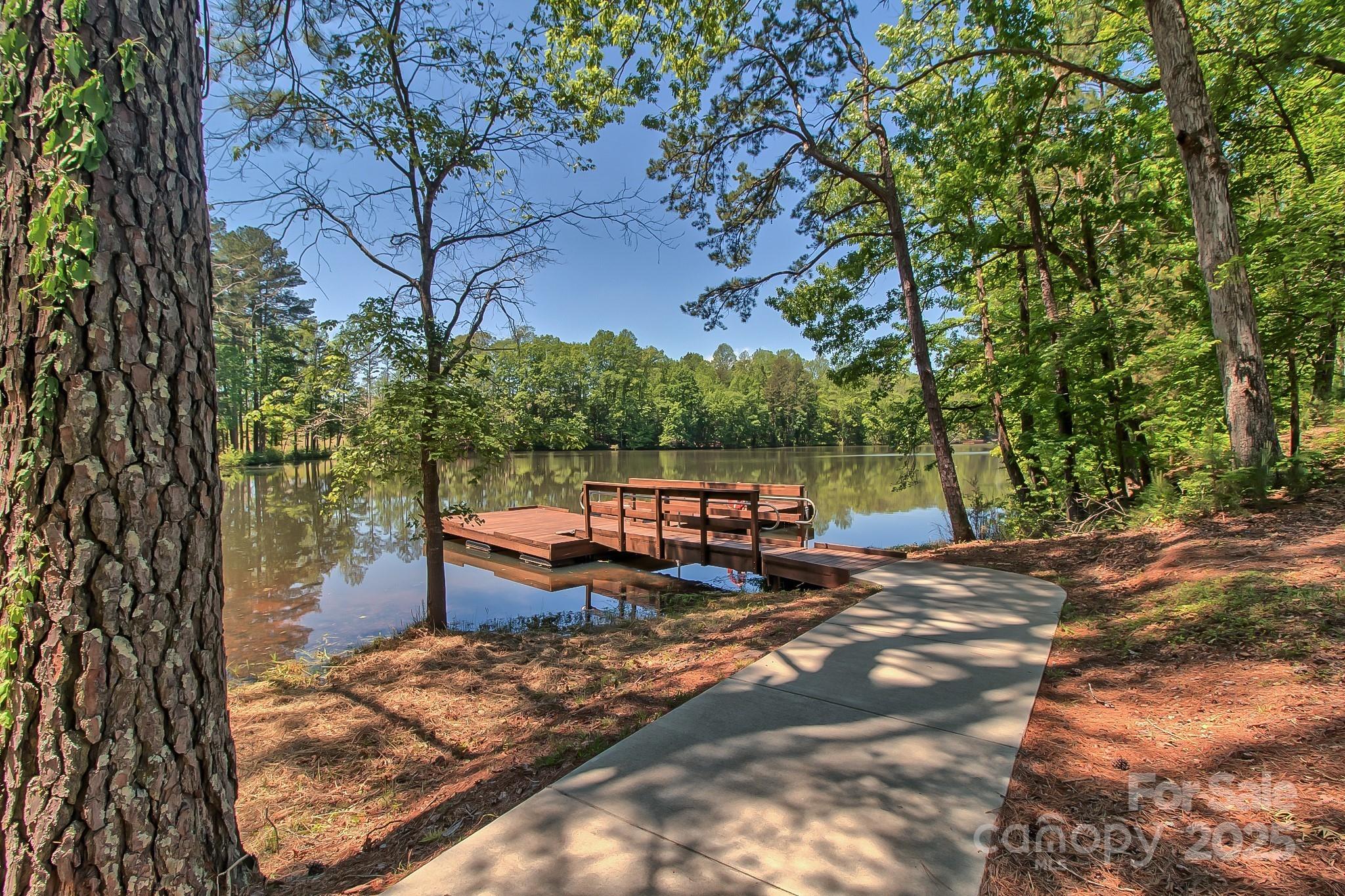 5002 Samoa Ridge Drive Lancaster, SC 29720 - Photo 41 of 45 a view of a backyard with a small cabin