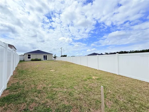 a view of backyard of house