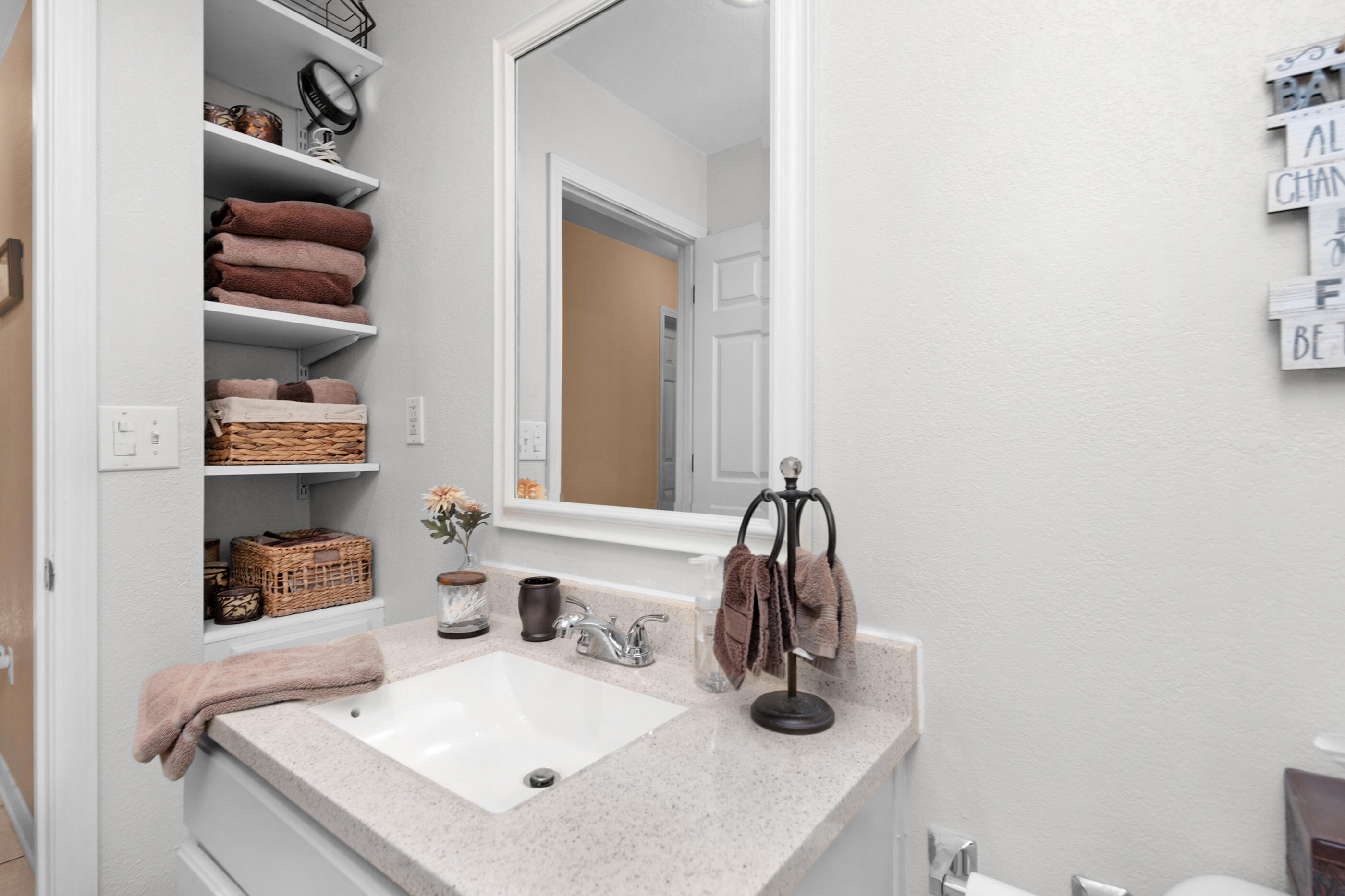 1984 Pine Ranch Drive Navarre, FL 32566 - Photo 14 of 45 a bathroom with a sink and a mirror