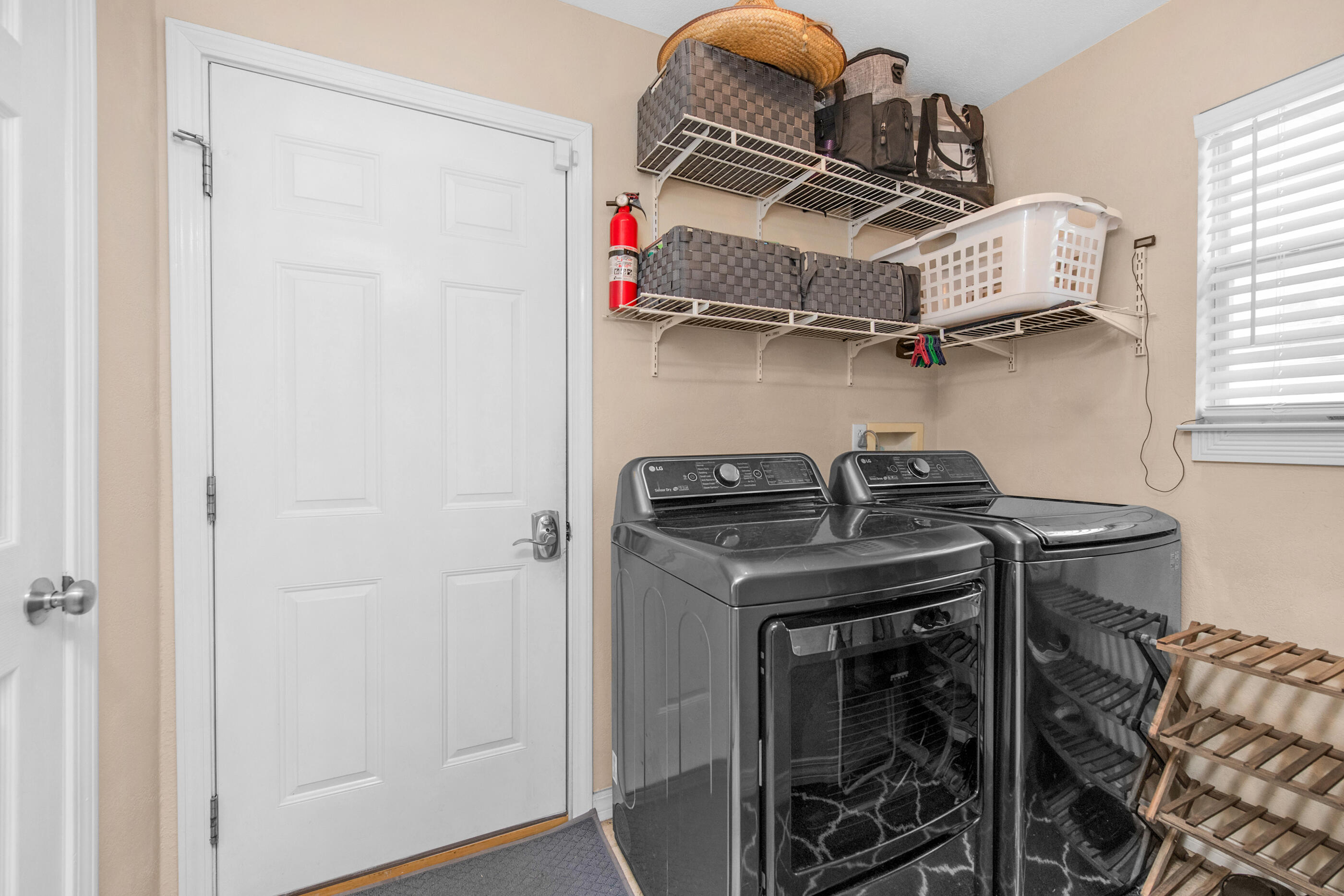 1984 Pine Ranch Drive Navarre, FL 32566 - Photo 26 of 45 a utility room with dryer and washer