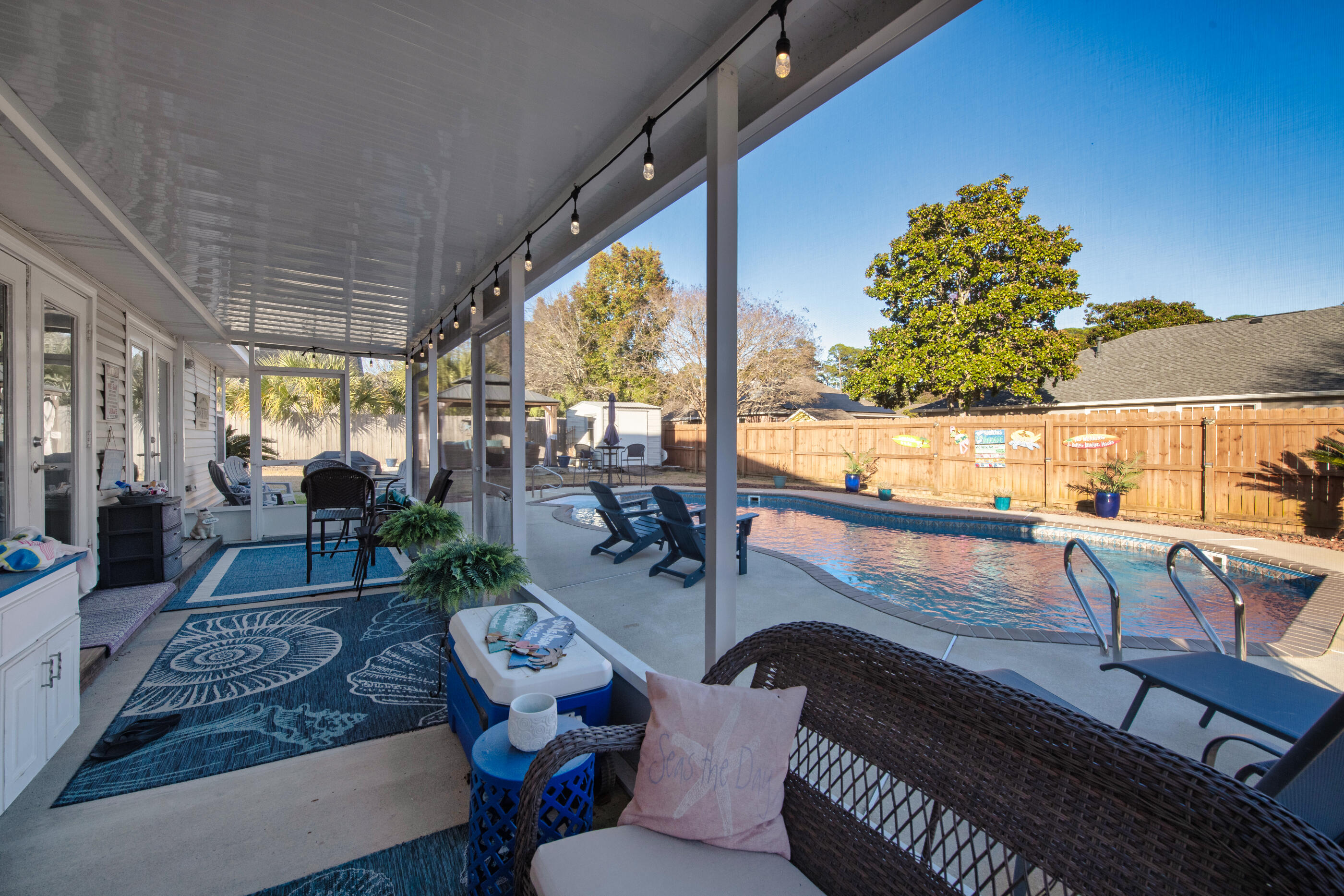 1984 Pine Ranch Drive Navarre, FL 32566 - Photo 30 of 45 a living room with furniture and a large window