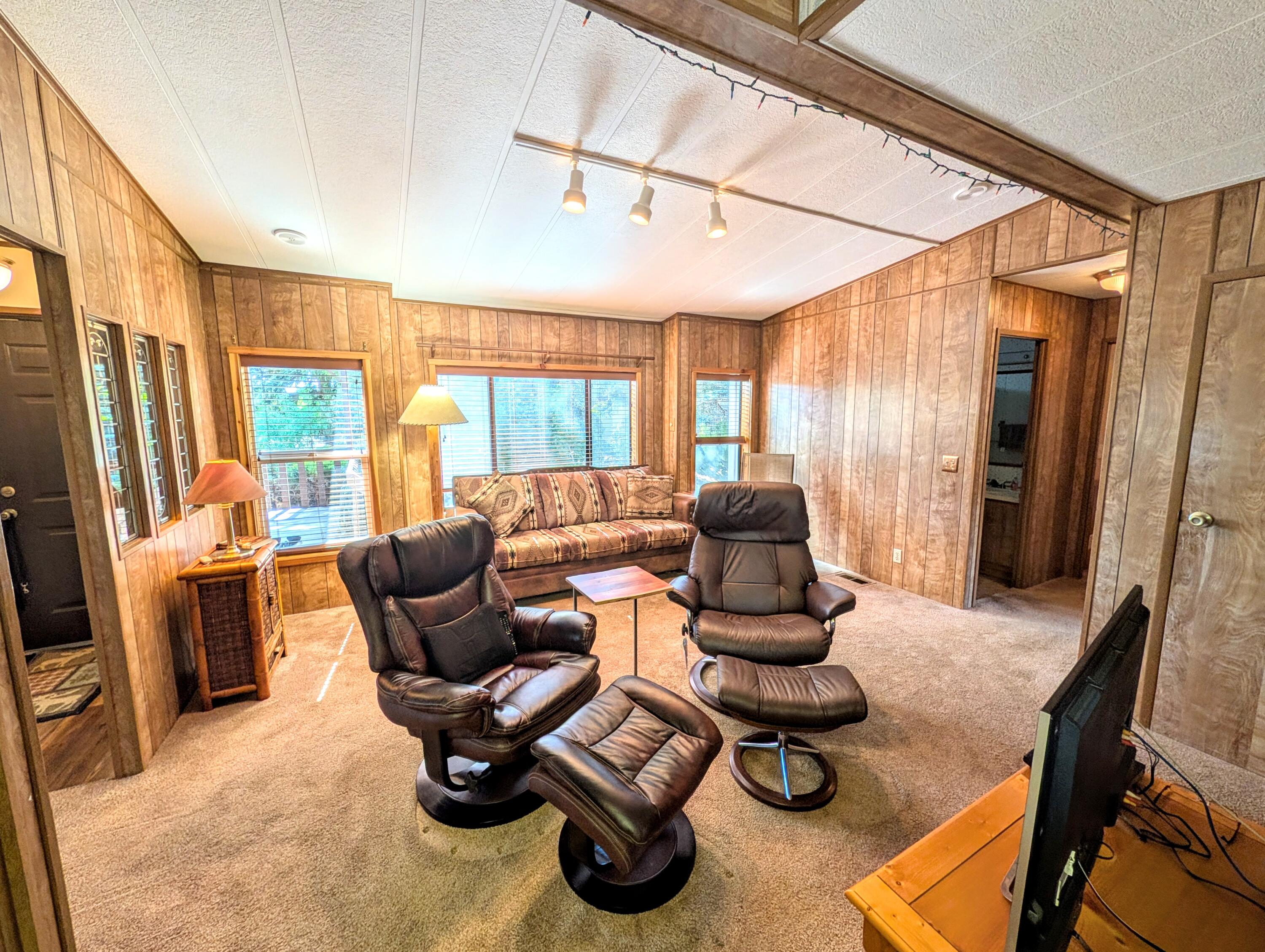 20735 Valentine Street, Unit 6 Bend, OR 97701 - Photo 3 of 26 a room with furniture or large windows