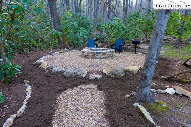 a backyard of a house with seating space