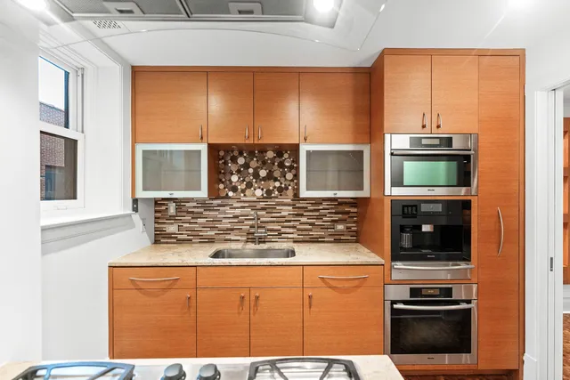 a view of a hallway with a white walls