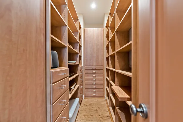 a view of hallway with window and couch