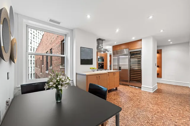 a bathroom with a tub and a sink