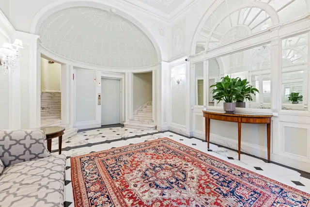 a view of an entryway with a rug