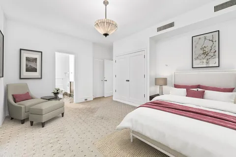 a living room with furniture fireplace and a flat screen tv