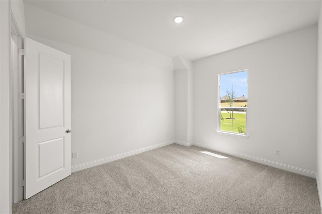 27 Old Crow Road Joshua, TX 76058 - Photo 8 of 35 a view of an empty room with a window