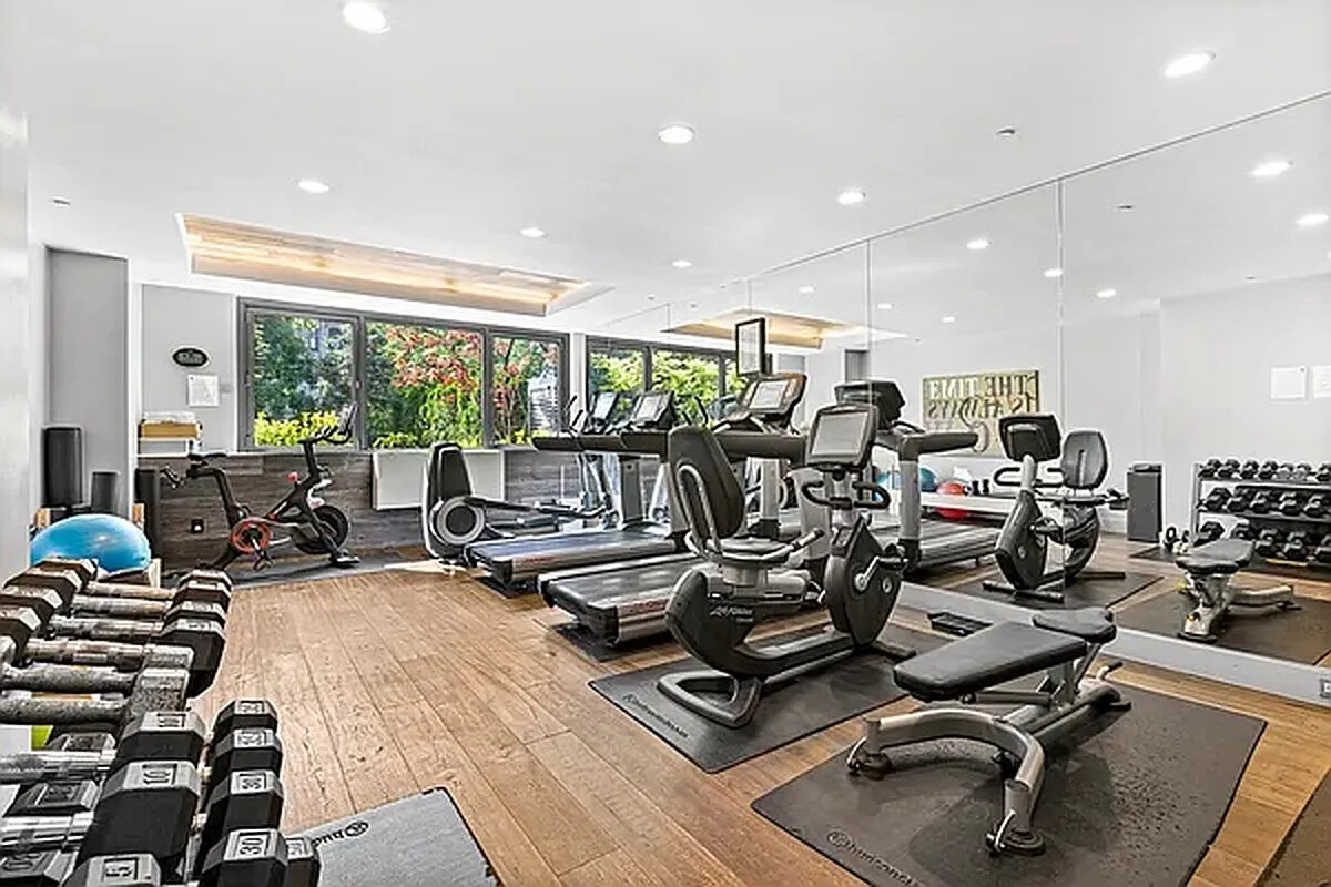 305 West 16th Street, Unit 5F Manhattan, NY 10011 - Photo 11 of 13 a view of a room with gym equipment