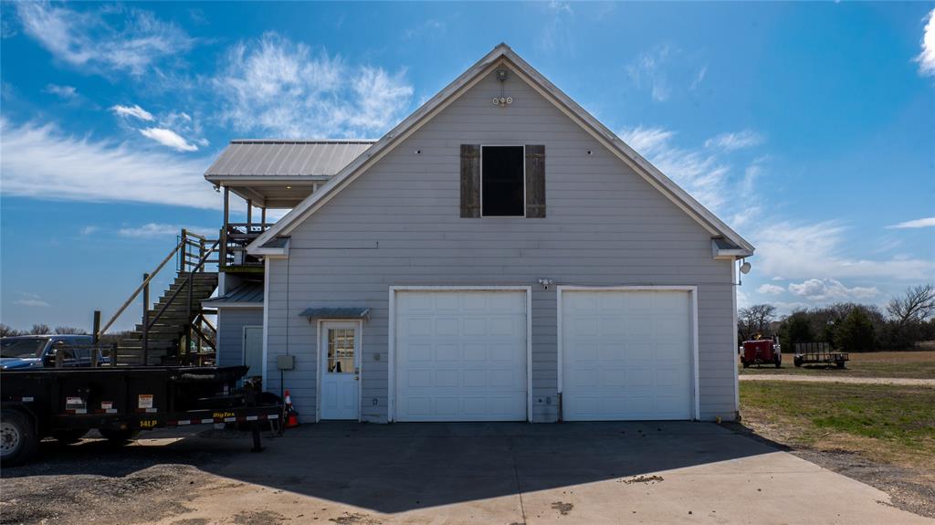 1408 Hackberry Road Van Alstyne, TX 75495 - Photo 6 of 6 a view of a house with a yard