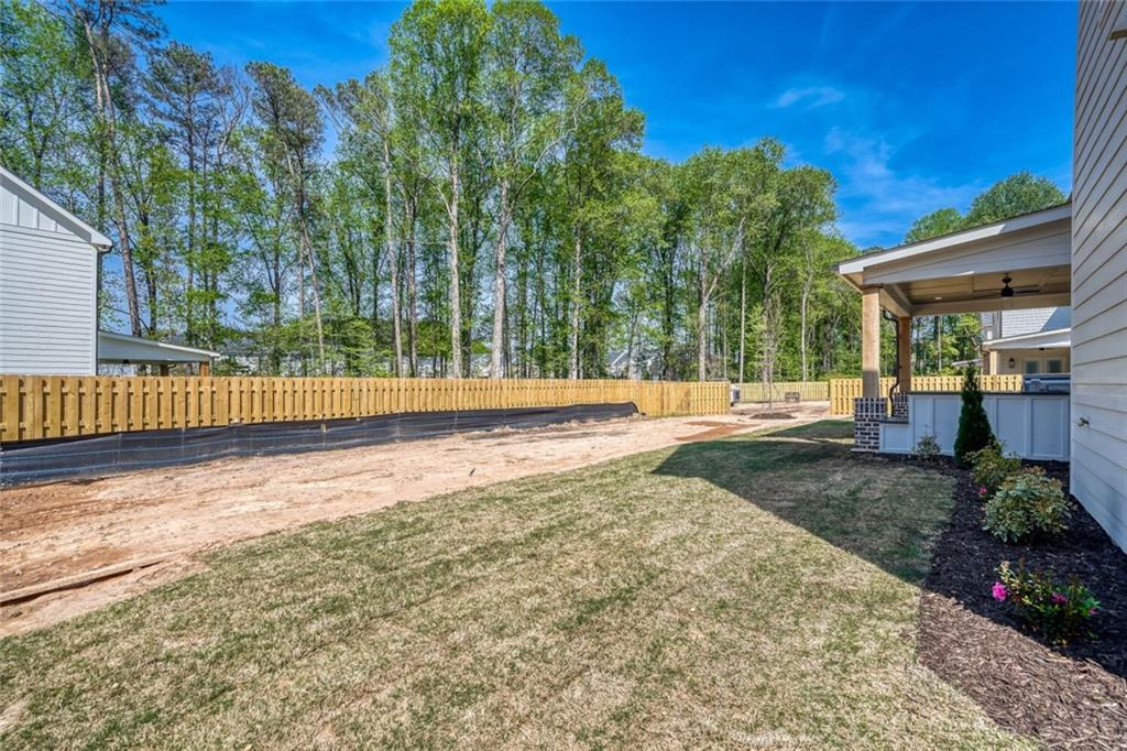 936 Cooper Road Loganville, GA 30052 - Photo 33 of 34 a view of backyard with green space