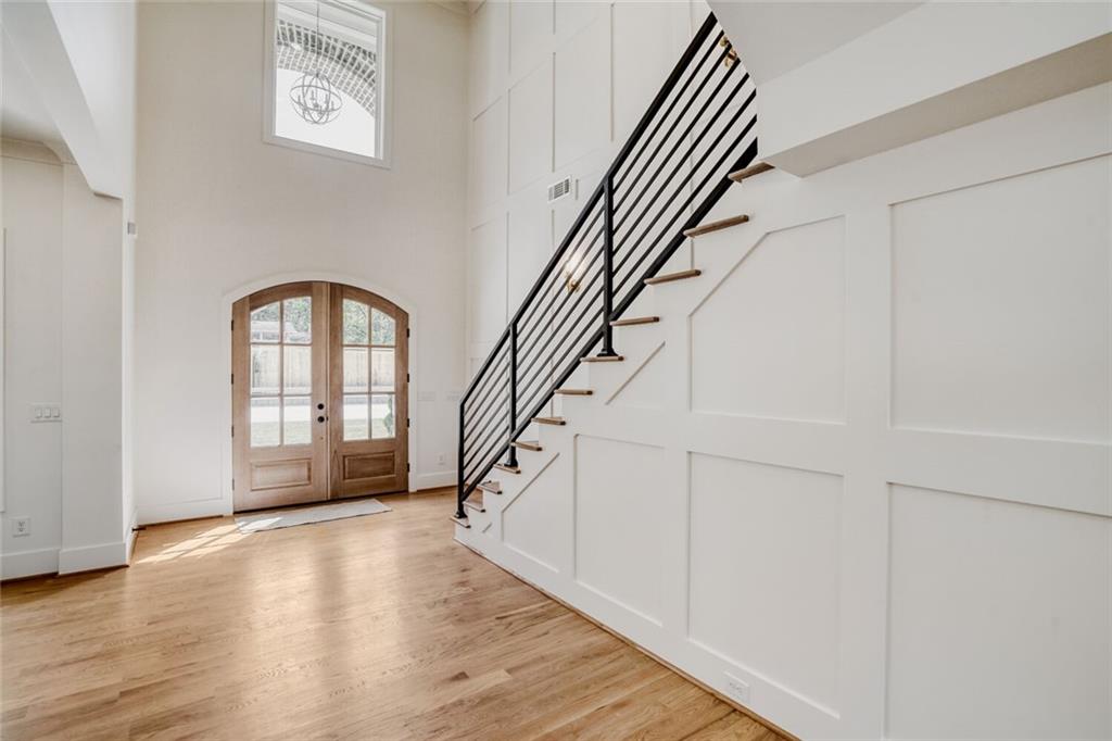 936 Cooper Road Loganville, GA 30052 - Photo 5 of 34 a view of an entryway with wooden floor