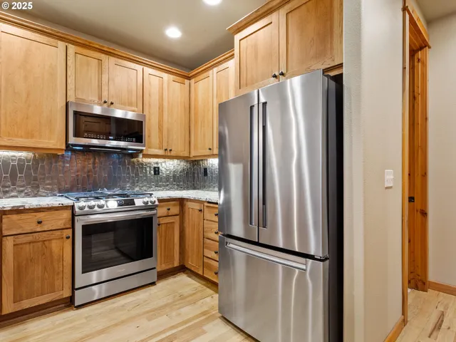 a kitchen with sink and window